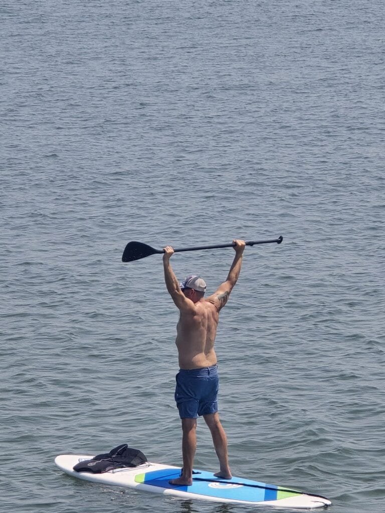 Owner of Green Wave Watersports, Jason Brown, conquering the Chesapeake Bay at Buckroe Beach! Contact Us - Green Wave Watersports