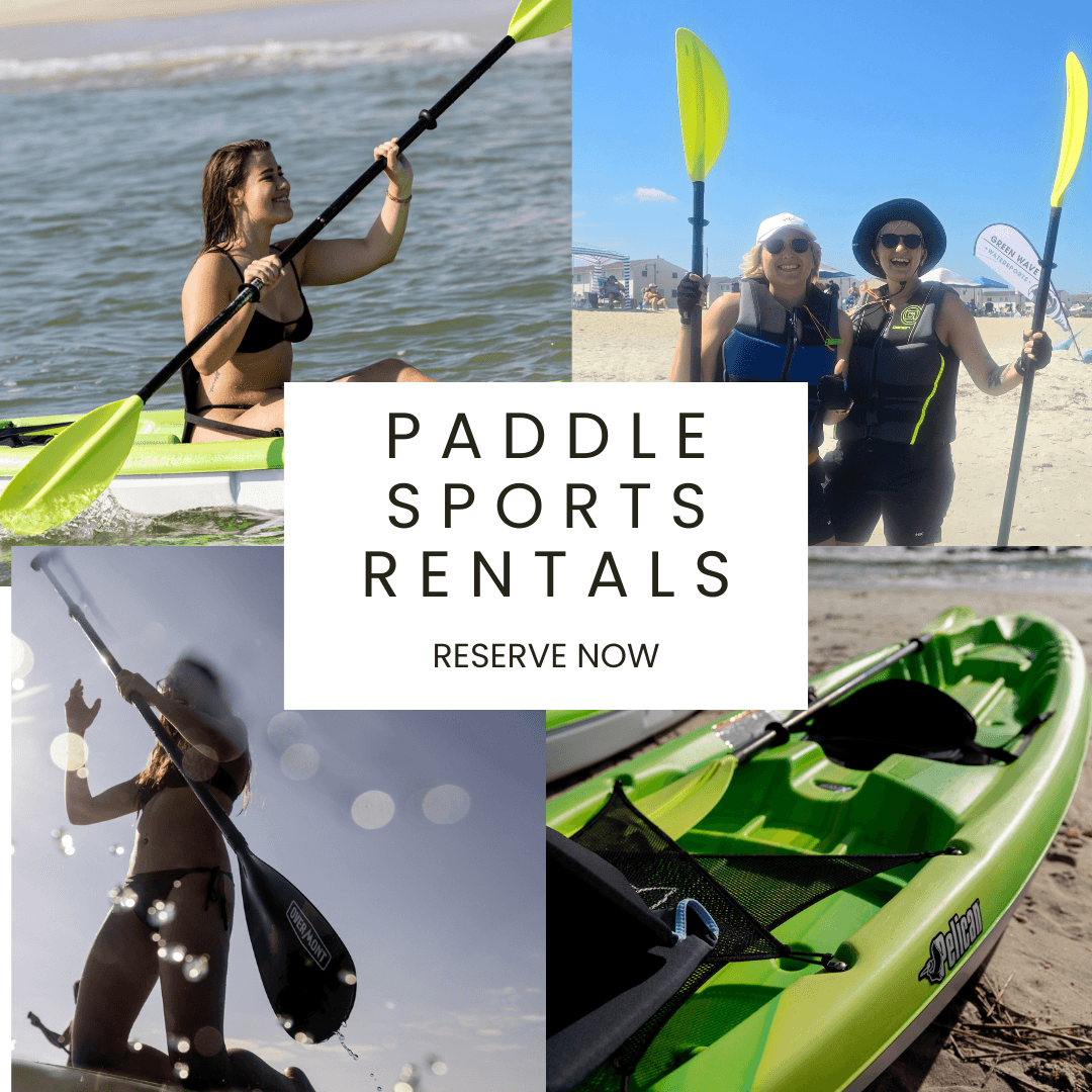 Kayakers paddling and posing with bright green tandem kayaks on the beach.
